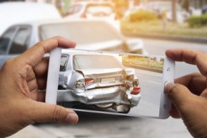 Car Insurance Agents Take Pictures Of Accident Damaged Vehicles With A Smartphone As A Proof Of Insu E1584673739834